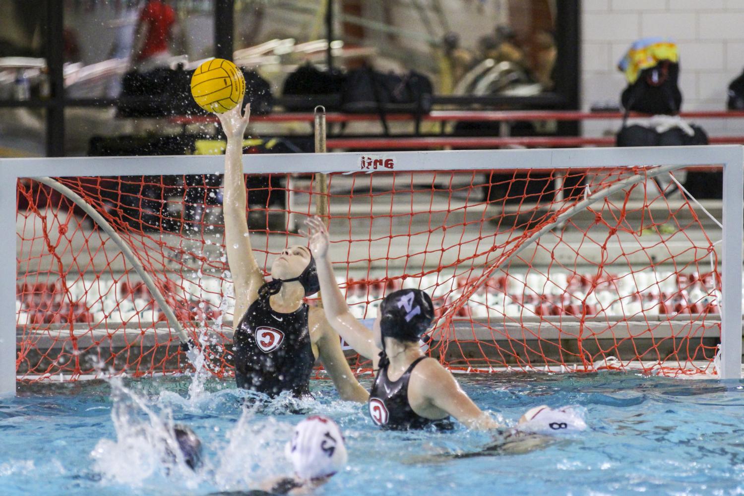 <a href='http://jfllem.femdomcenter.com'>全球十大赌钱排行app</a> student athletes compete in a water polo tournament on campus.
